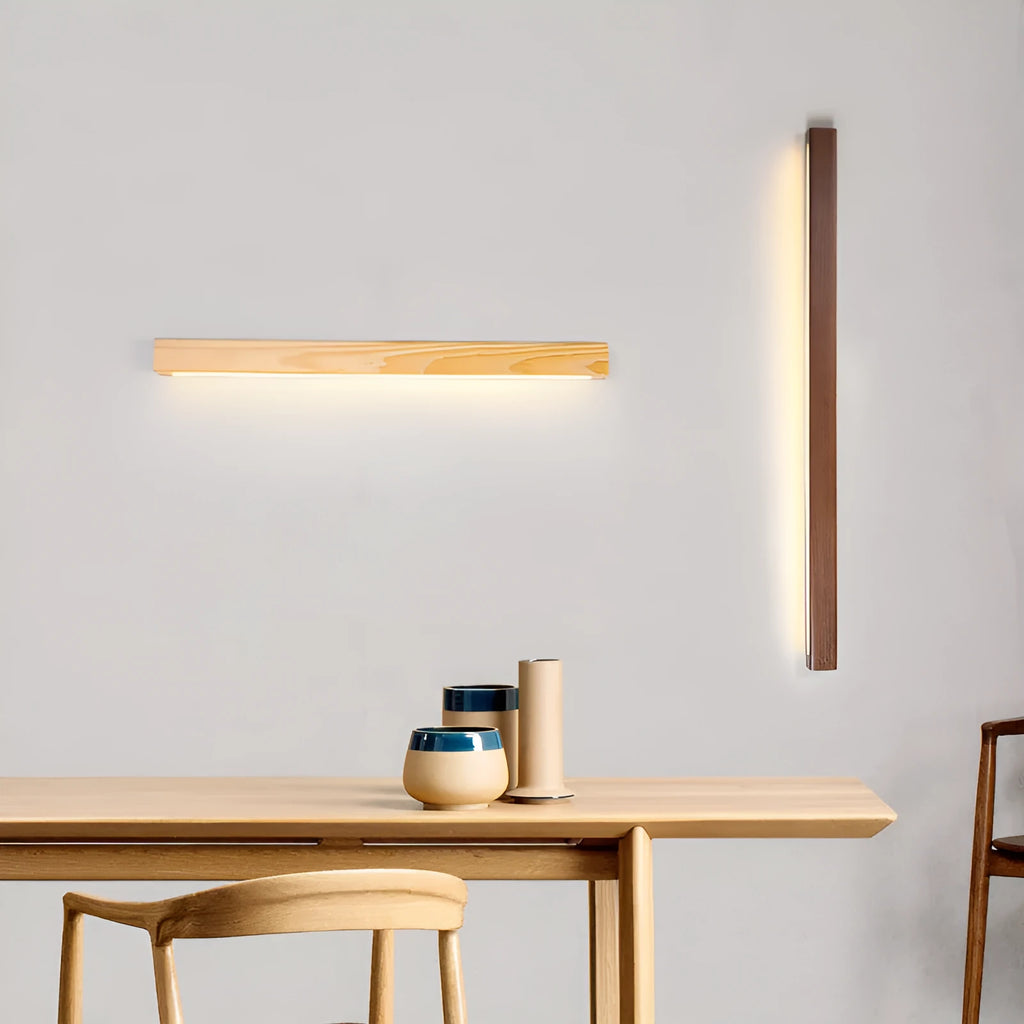 Walnut-coloured minimalist log strip wall lamp with wood and acrylic construction in three length options