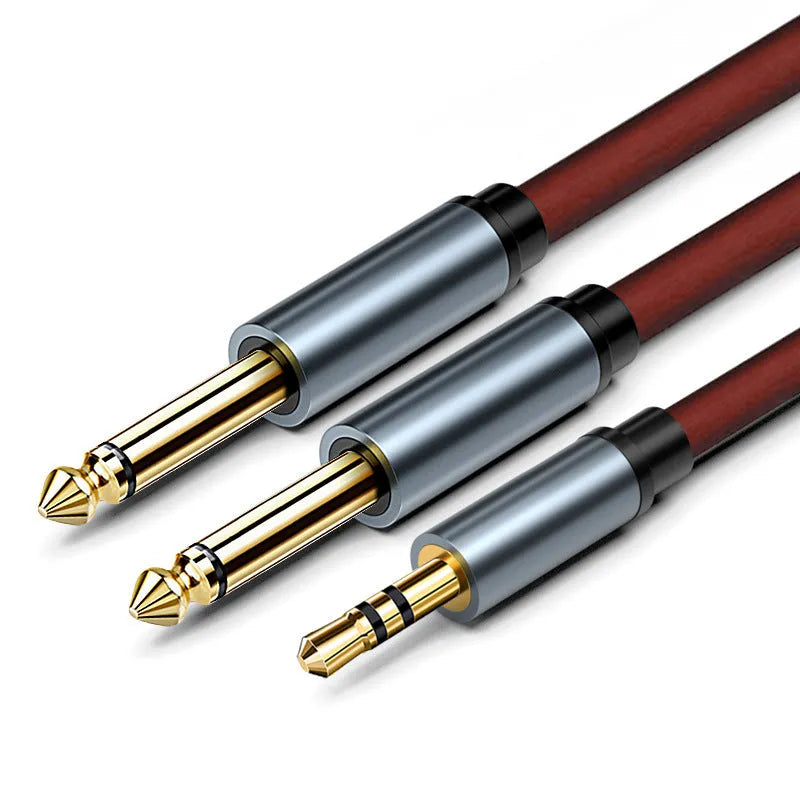 3.5mm to two 6.5mm male audio cable with black jacket and metal connectors.