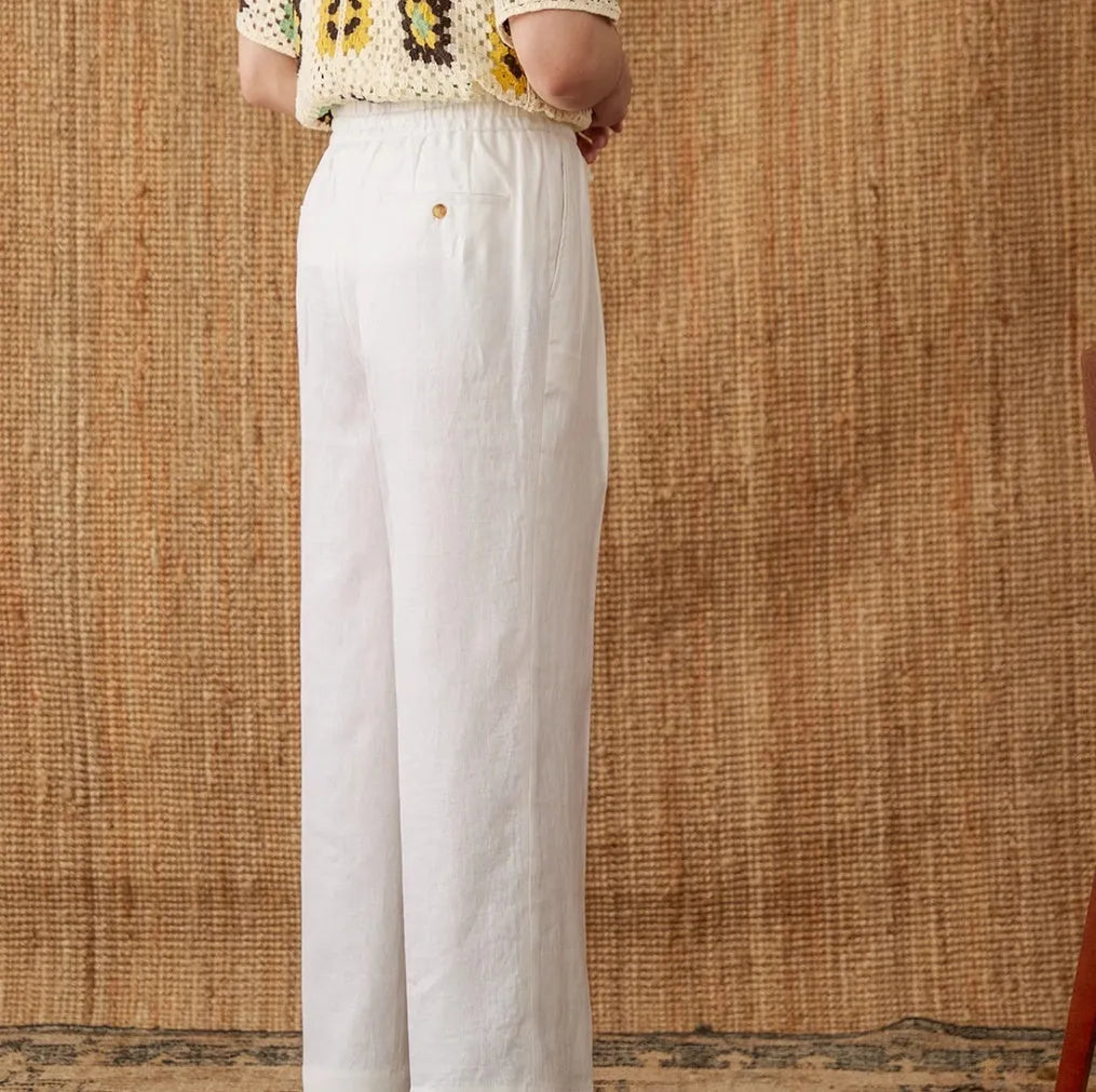 Linen straight-leg trousers with elasticated high waist and lace detail in greige colour.