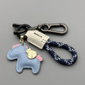 Handmade cowhide car key ring pendant with zinc alloy pony buckle charm and plant flanelle rope loop