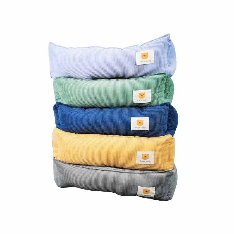 Square cloth pet bed with printed fabric finish, shown in one of five colours and available in 40x50cm or 50x60cm
