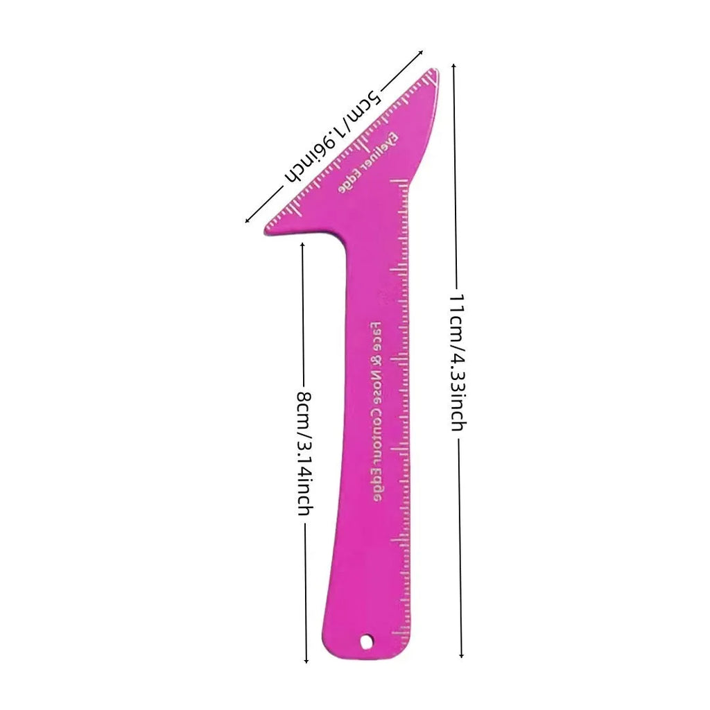 A reusable pink 3-in-1 makeup stencil tool for winged eyeliner, eyebrows, and face contouring on a vanity.