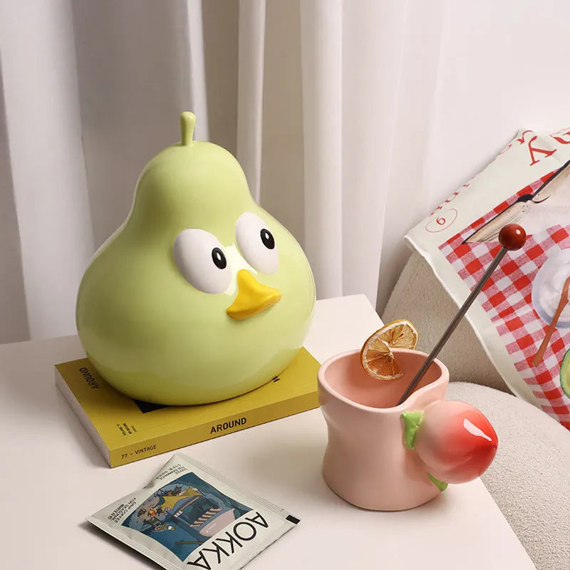 White porcelain ceramic pear-shaped tissue box with animal style design in green or black colour options