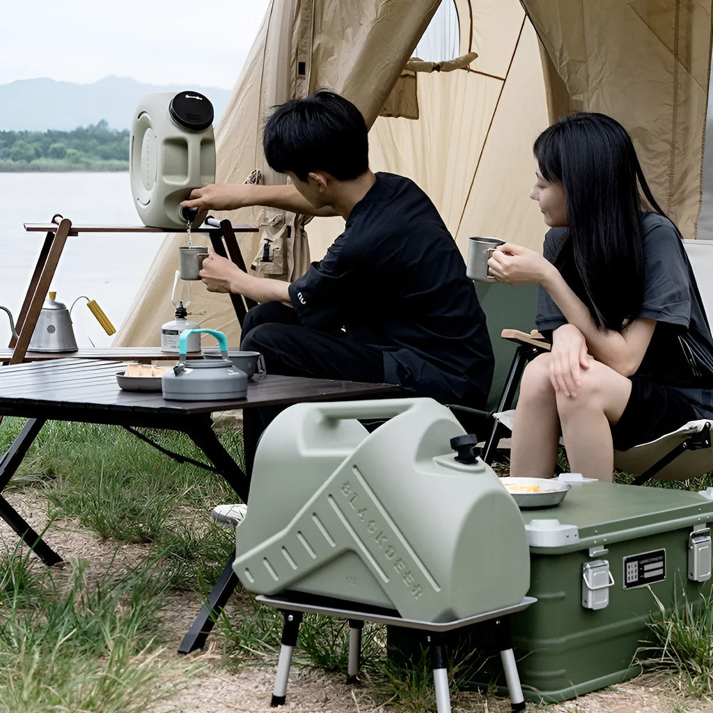 Green collapsible PP water storage tank with carry handle in 13L and 18L sizes.