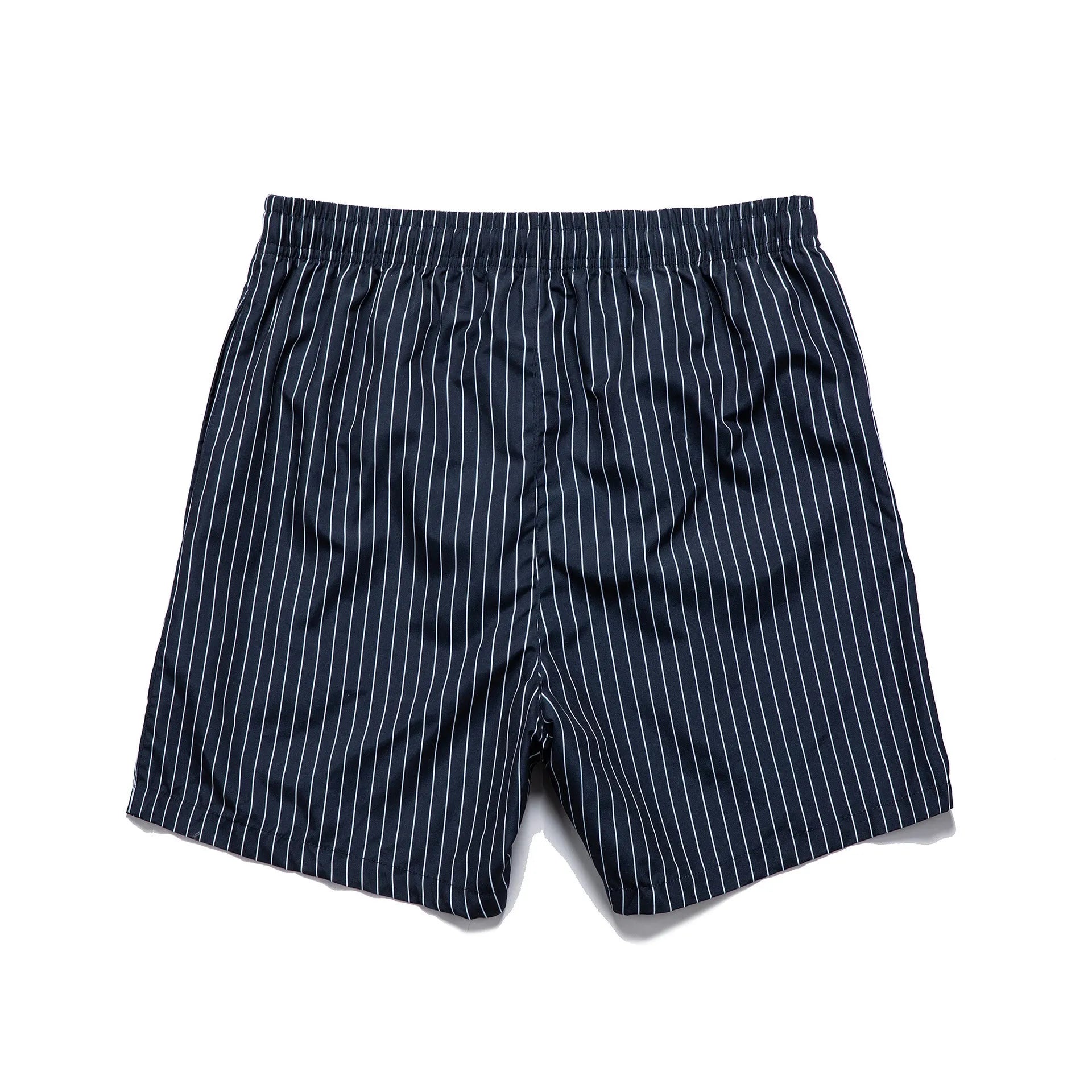 A pair of striped beach shorts in a light blue colour with a straight leg opening, laid flat.