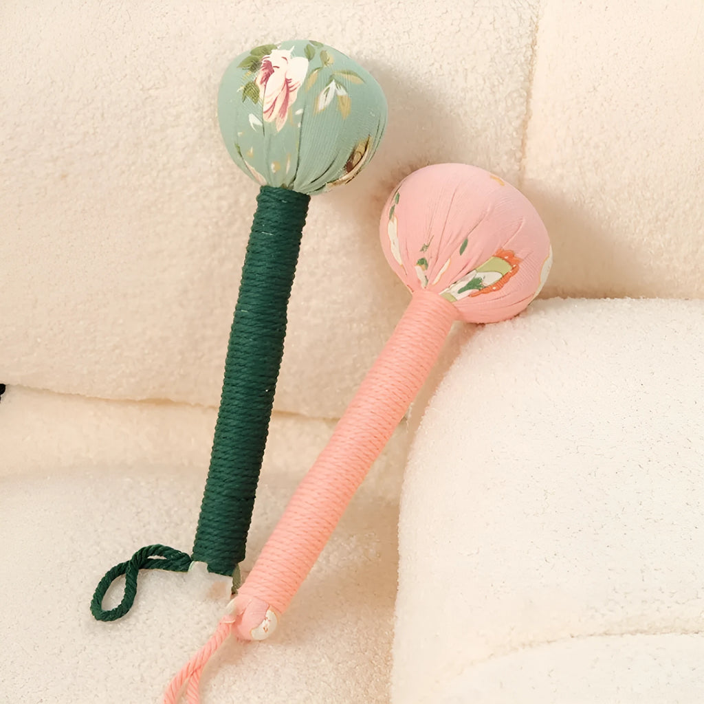 Argy wormwood massage hammer in green colour showing hand-held design for neck and shoulder massage