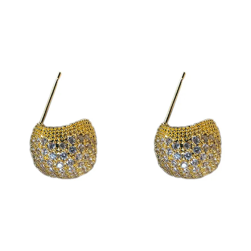 Women's gold and white drop-shaped ear clip earrings with full diamond embellishment and geometric golden beans design