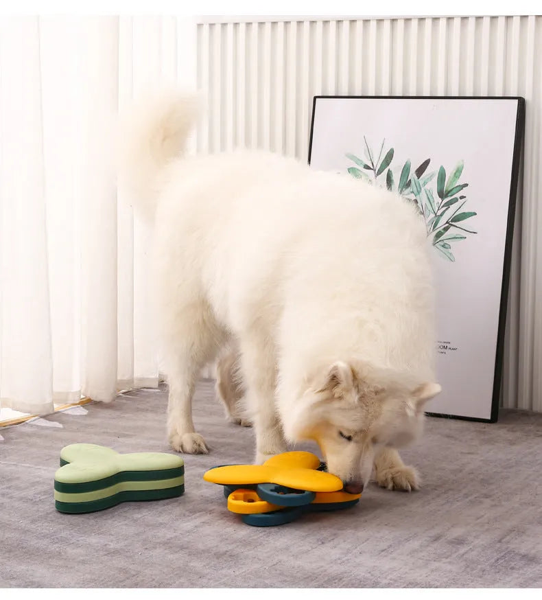 Green and yellow dog puzzle toy slow feeder with nine hidden treat compartments and bone covers