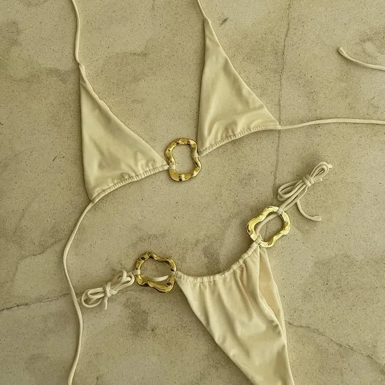 Women's solid colour halter bikini set with lace-up front detail and low-waist briefs.