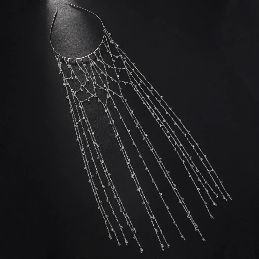Rhinestone mesh headband with tassel detail in gold or silver electroplated finish