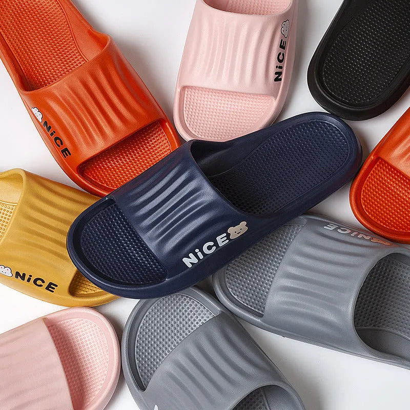 A pair of EVA flip flop slippers with a cartoon pattern, shown in one of six available colours.