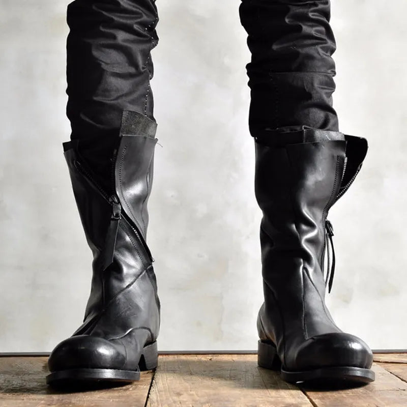 Black Japanese irregular deconstructed leather boots for men with high cylinder, round toe, thick bottom, and zipper closing.