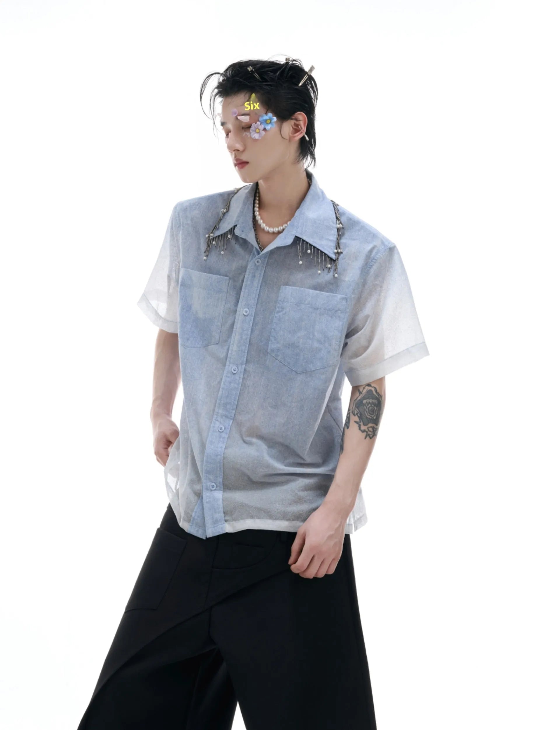 Blue to white gradient loose-fit short sleeve polyester shirt on a hanger.