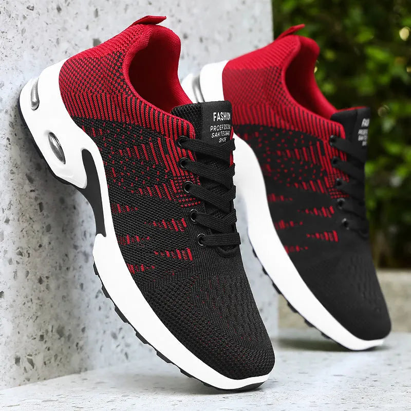 Men's Flyknit mesh low-top casual sneakers in black and grey colourway with lace-up front.