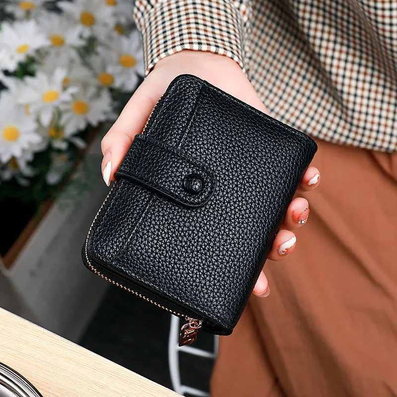 Women's lychee pattern organ short wallet in pu material with breathable antibacterial properties