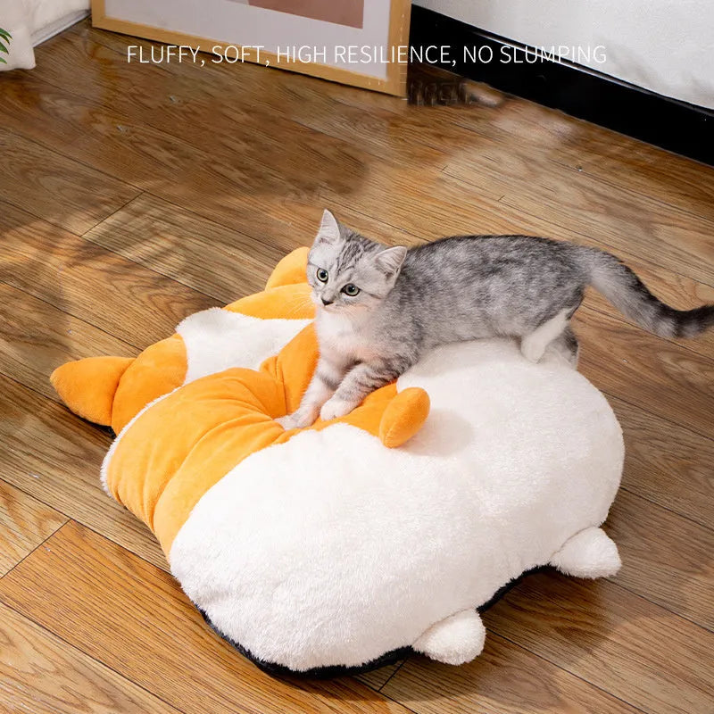 Orange semi-closed cat sleeping bag on a floor, showing its dimensions and sheltered design.