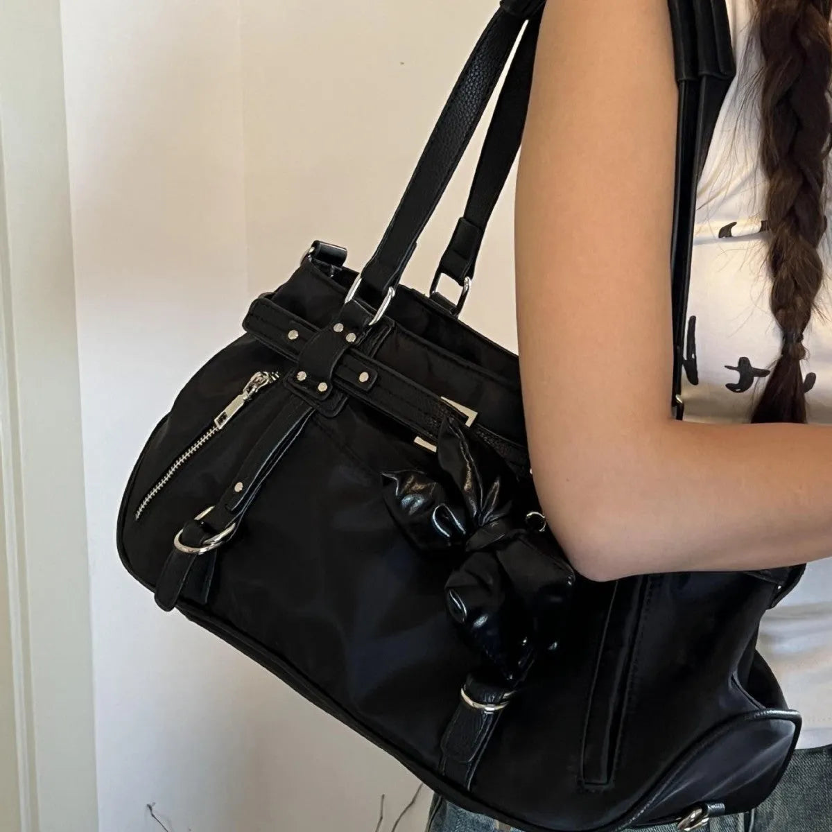Soft PU motorcycle satchel with headwind texture, underarm design, horizontal square shape in black colour
