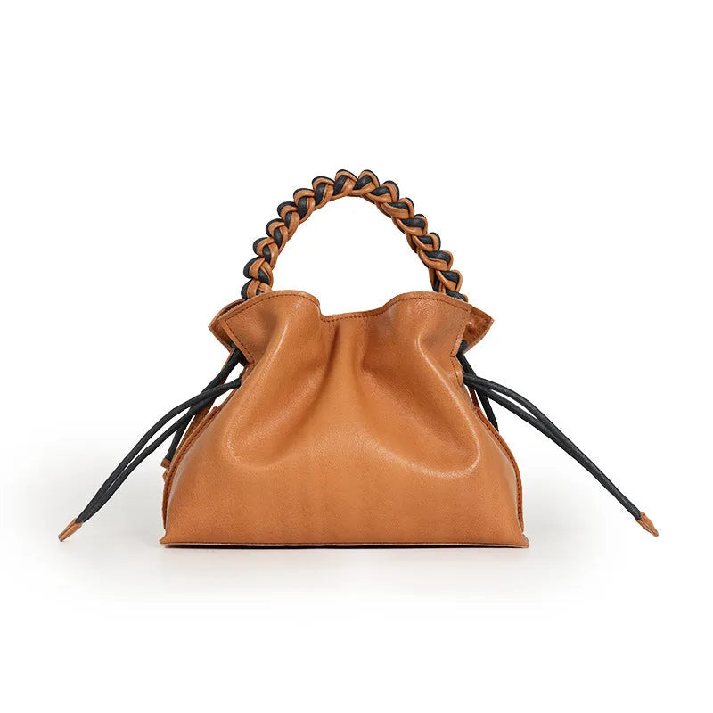 Women's cortex splicing woven leather crossbody bag in orange colour with top grain leather finish and zipper closure