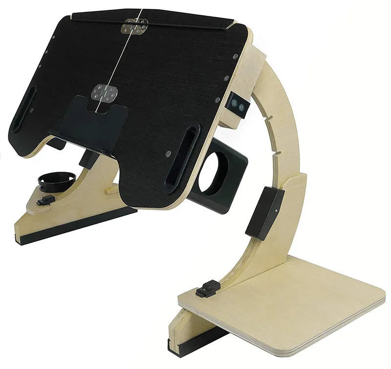 White wooden folding computer desk with adjustable angle, shown on a bed.