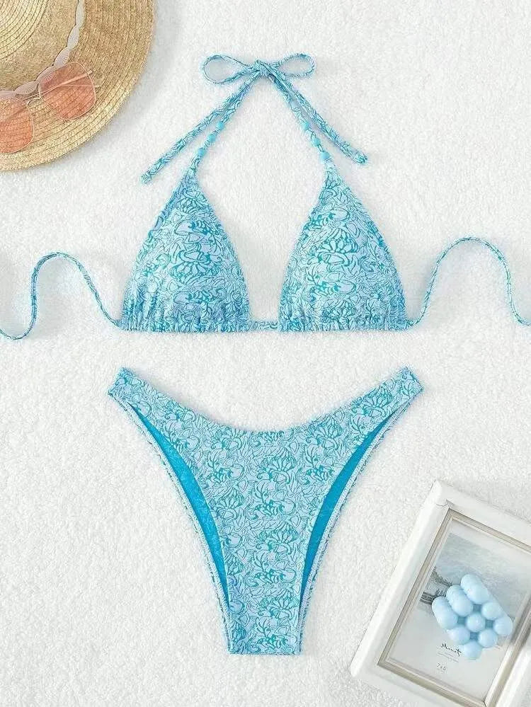 Women's floral halter bikini set with matching shorts in red, sky blue, sapphire blue or emerald green