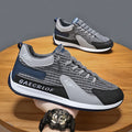 Men's grey and green mesh sports trainers with lace-up front and round toe.