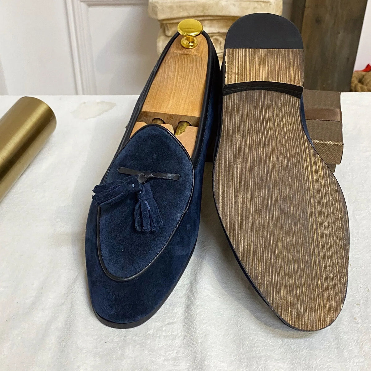 Pair of brown suede slip on loafers made from genuine cowhide leather for men