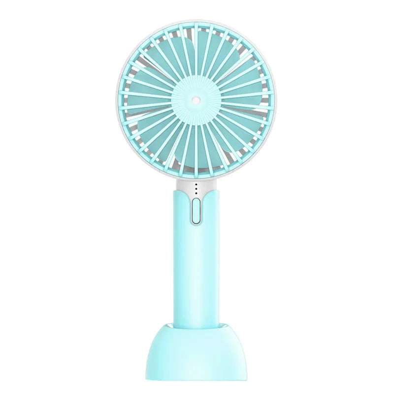 Blue handheld mini USB electric fan with oscillation feature on a desk.