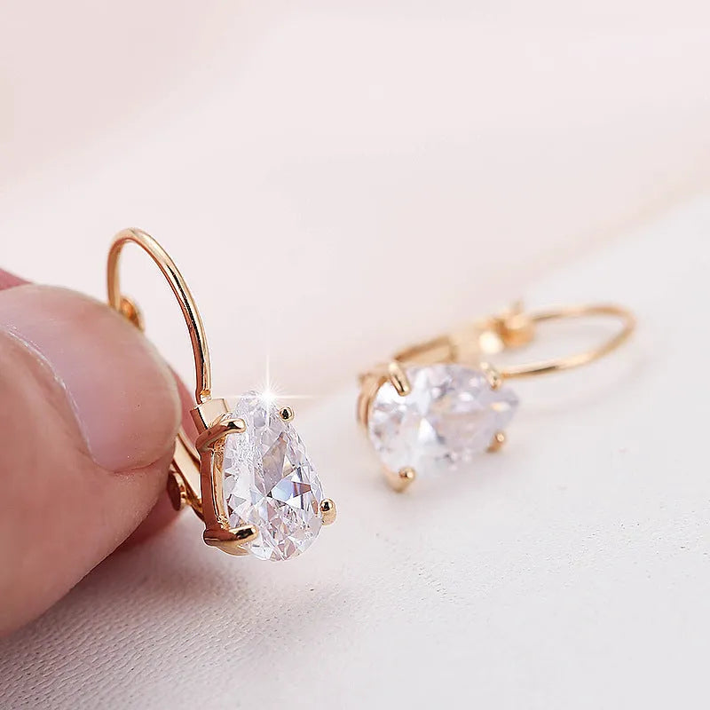 Copper drop-shaped earrings with platinum inlaid gemstone in gold and platinum colour options