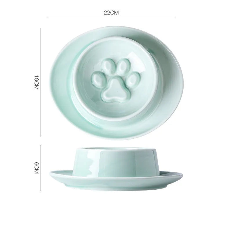 Green ceramic slow feed pet bowl with a central mound and obstacles to prevent fast eating.