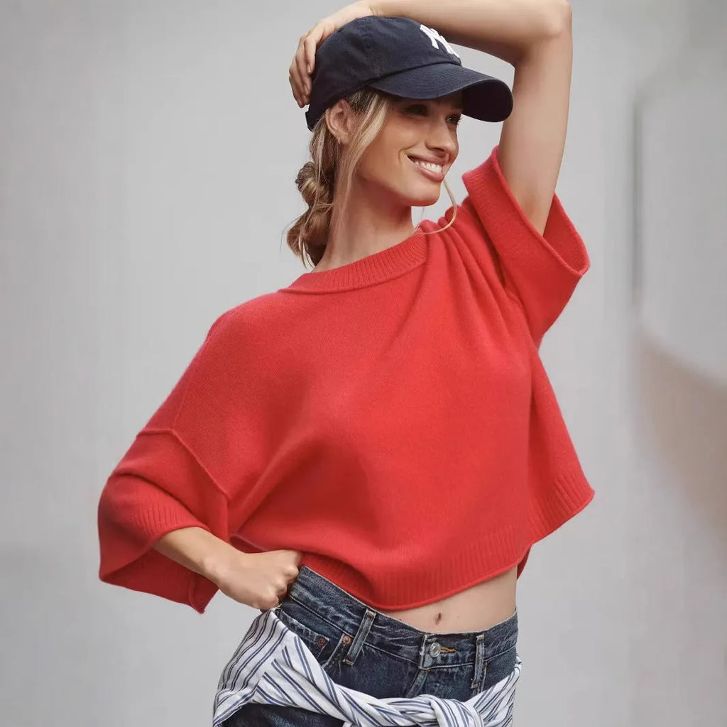 Red short sleeve viscose T-shirt with a cropped hem on a mannequin.