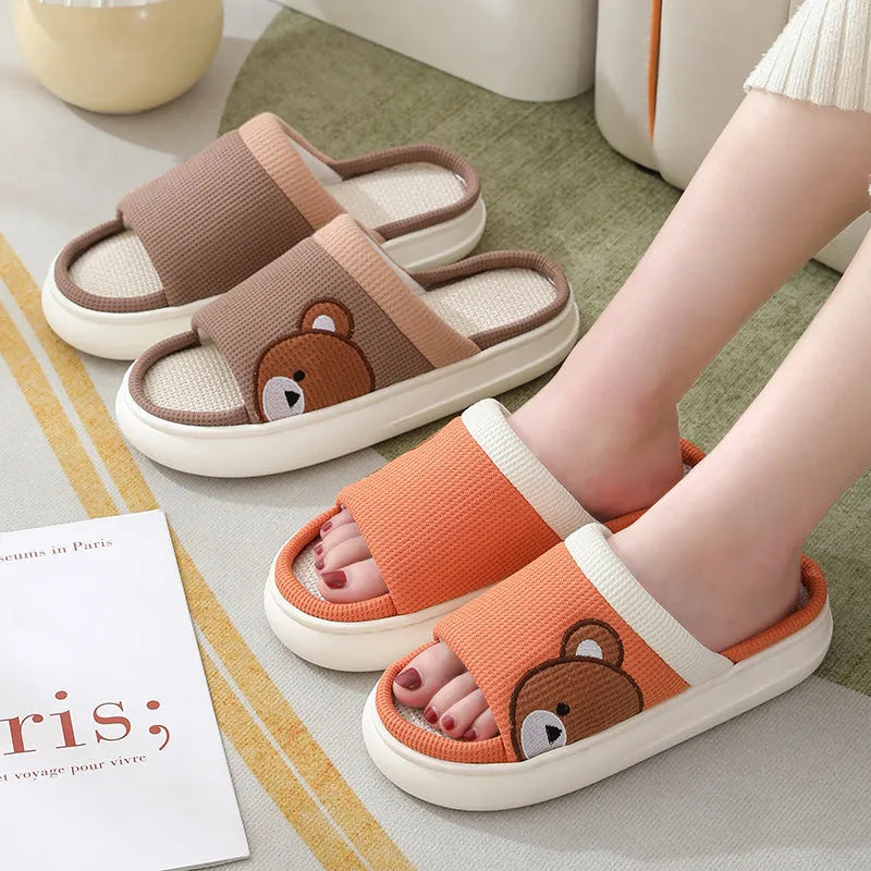 Cartoon bear cotton linen indoor slippers with PVC non-slip sole, shown in orange, pink, silver grey, and light brown