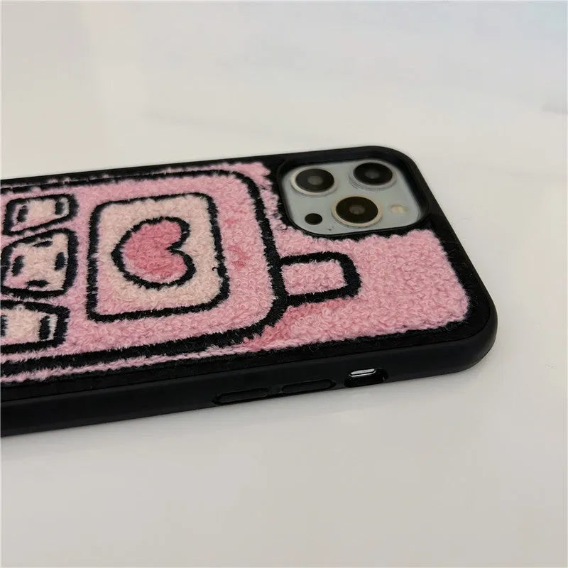 Pink TPU iPhone case with embroidered towel fabric design on back cover