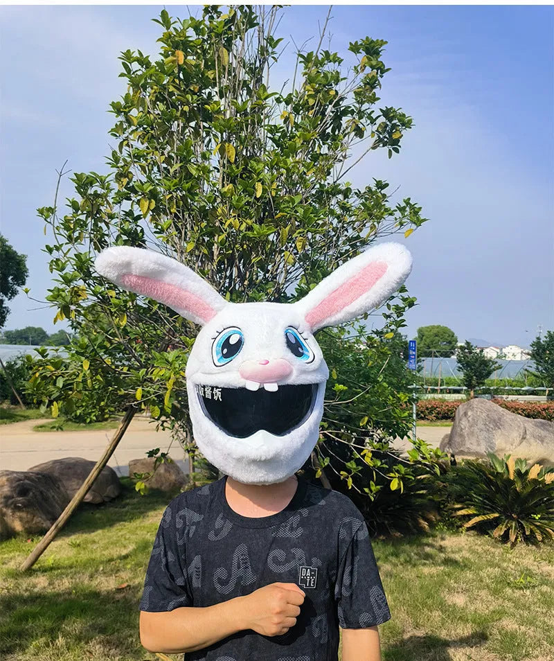 White plush rabbit head cover with long ears designed for an electric motorcycle helmet.