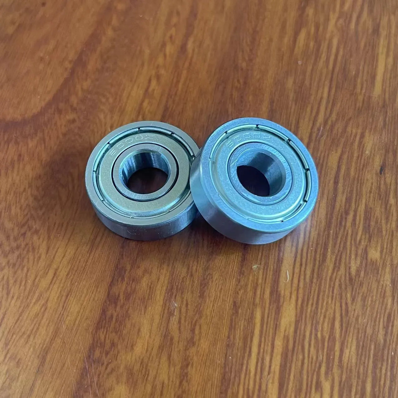 6000zz deep groove ball bearing with carbon steel construction and 10mm inner diameter, 26mm outer diameter.