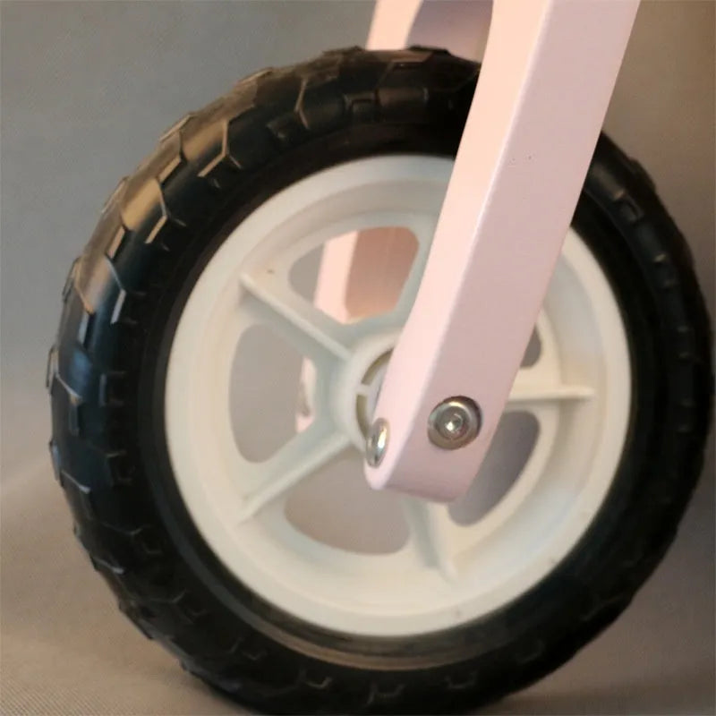 Pink wooden toddler balance scooter with 10-inch wheels for children aged 1-6 years.