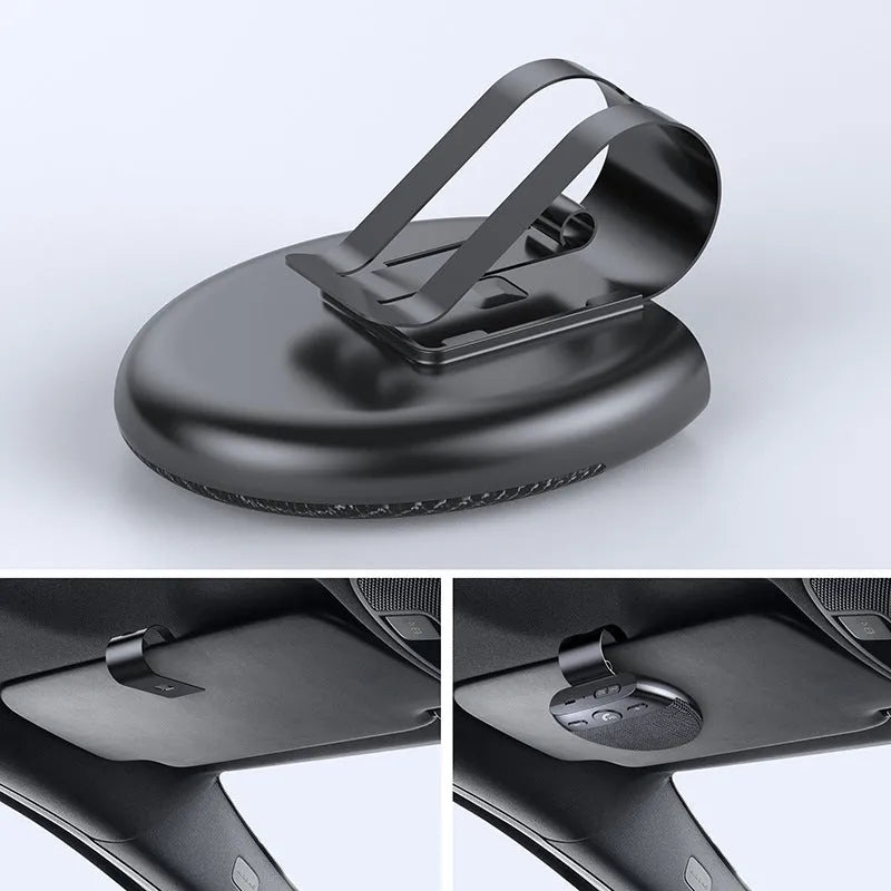 Bluetooth car handsfree device clipped to a car sun visor with black finish