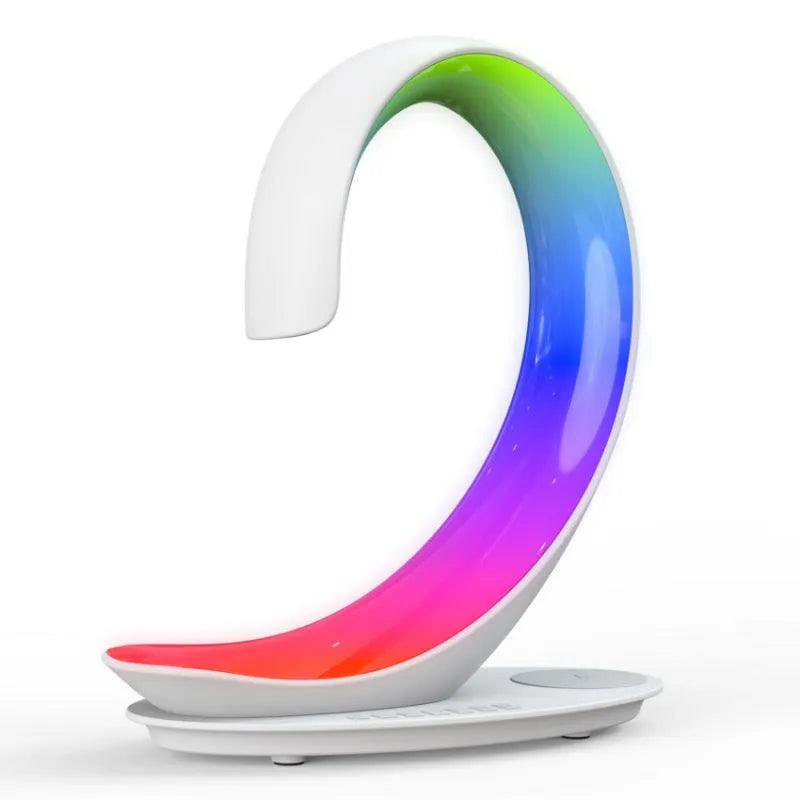 White swan shaped desktop wireless charger with Bluetooth speaker and colourful atmospheric lighting