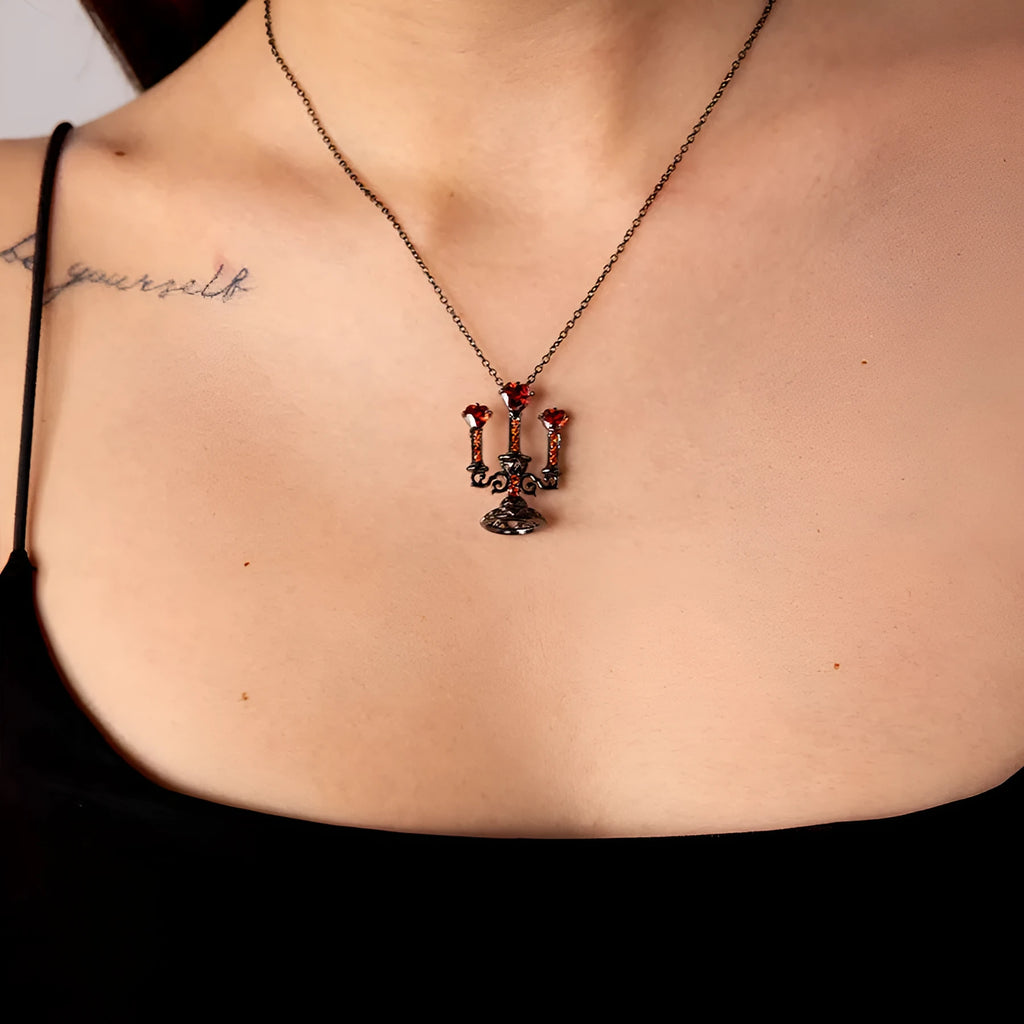 Gothic women's necklace with hollow candlestick pendant on a cross chain in retro finish.