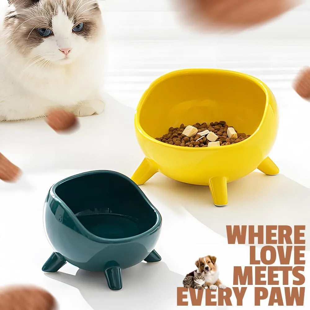 Green ceramic pet food bowl with four legs and wide mouth opening for cats and small dogs