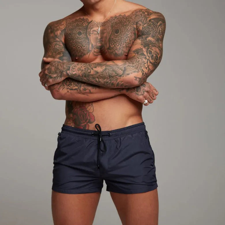 Men's lightweight nylon swim shorts with drawstring and elastic waistband