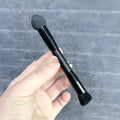 Concealer brush with triangular sponge head and wood handle for dark circles