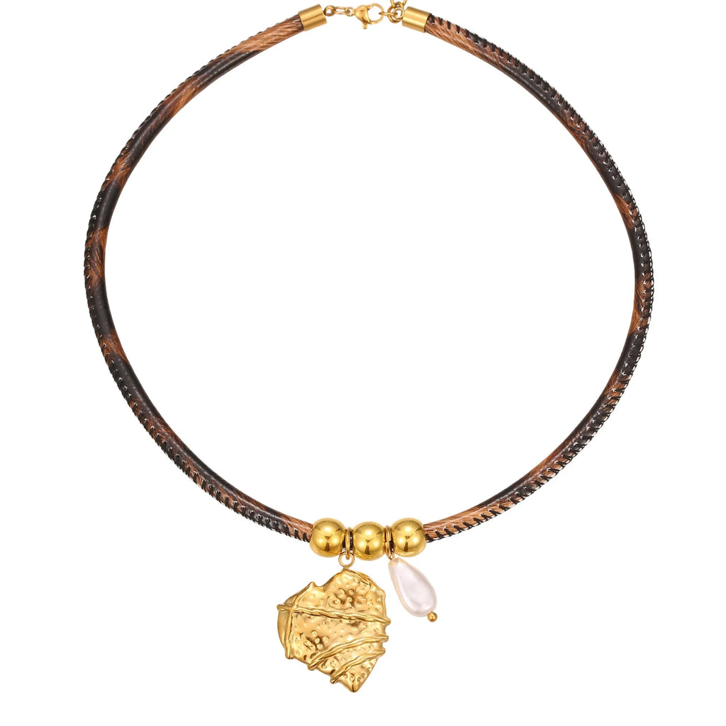 Women's stainless steel leopard pendant necklace with geometric design and gold-plated finish on adjustable chain