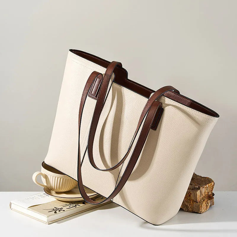 Women's genuine leather crossbody bag with horizontal square design and multiple interior compartments in black colour