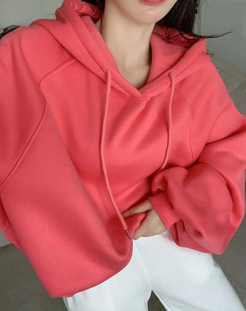 Women's loose hooded mulberry silk sweater in watermelon red colour with sleeveless design