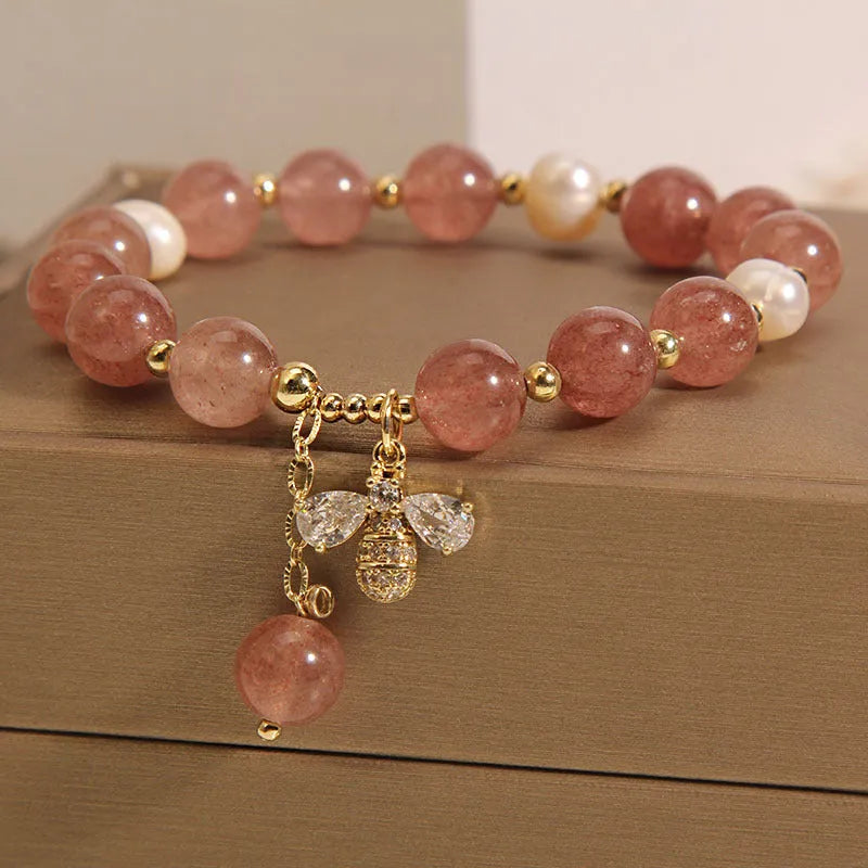 Women's pink strawberry quartz and freshwater pearl bracelet with zircon and alloy accents.