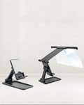 Black 12 inch mobile phone screen amplifier with detachable phone holder on desktop