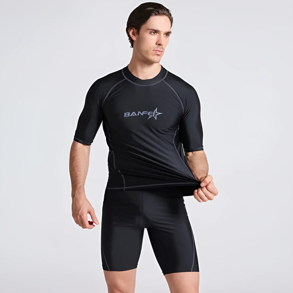 Men's blue half-sleeve quick-dry nylon swimsuit top and pants set for swimming and surfing.