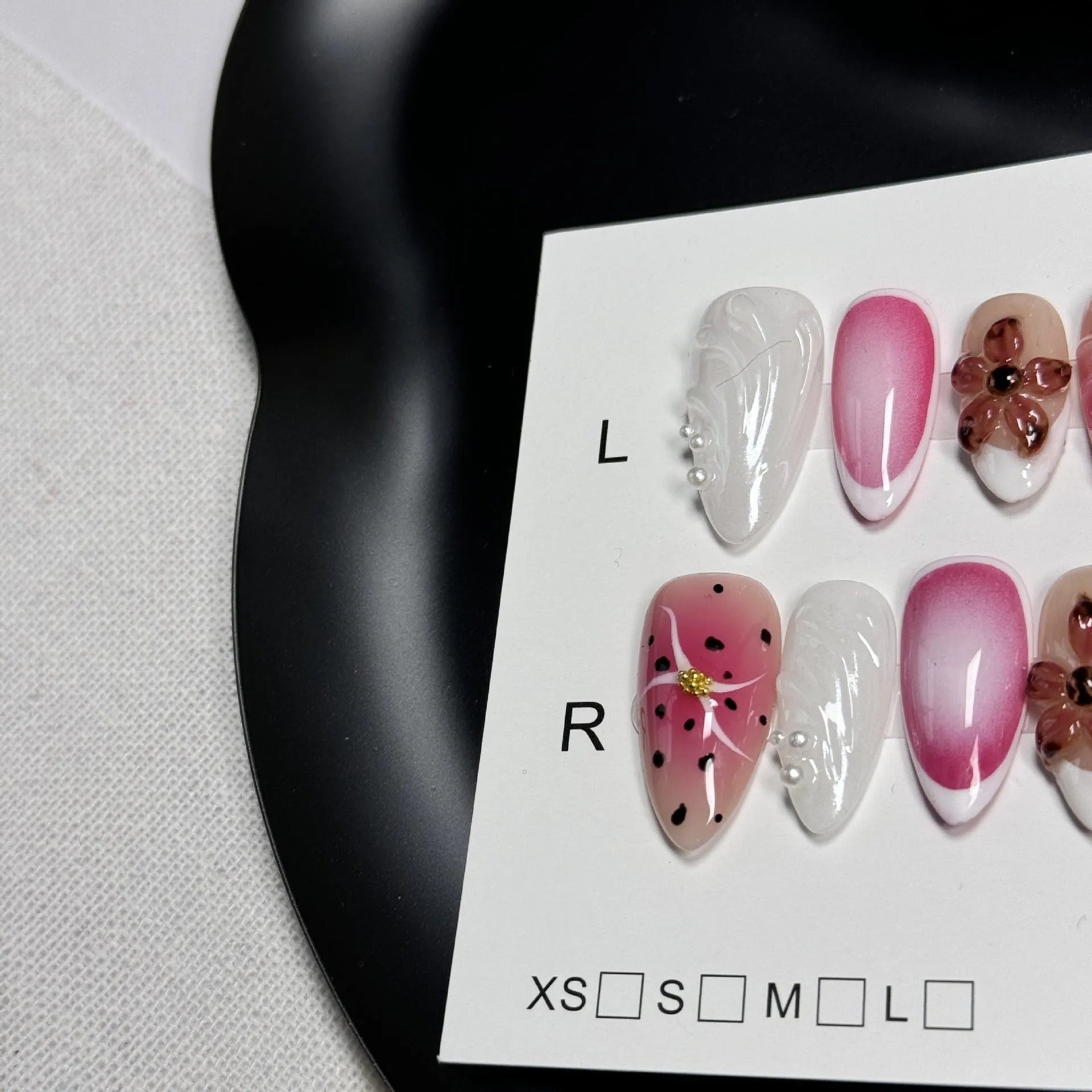 Hand-painted 3D carved nail beauty patches in embossed candy patterns on almond-shaped nails.