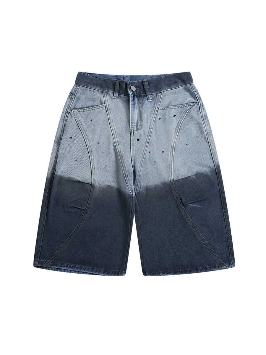 Blue tie-dye gradient cropped jeans with a washed-out finish and loose fit.