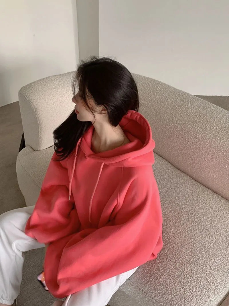 Women's loose hooded mulberry silk sweater in watermelon red colour with sleeveless design
